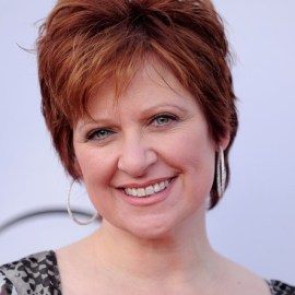 Caroline Manzo Layered Short Red Hairstyle for Women Over 50s