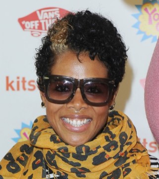 Casual short curly hairstyle with highlights Casual short curly hairstyle with highlights