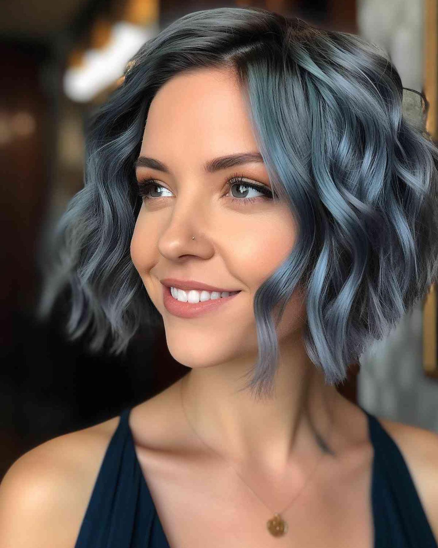 choppy wavy bob with dark blue hair color