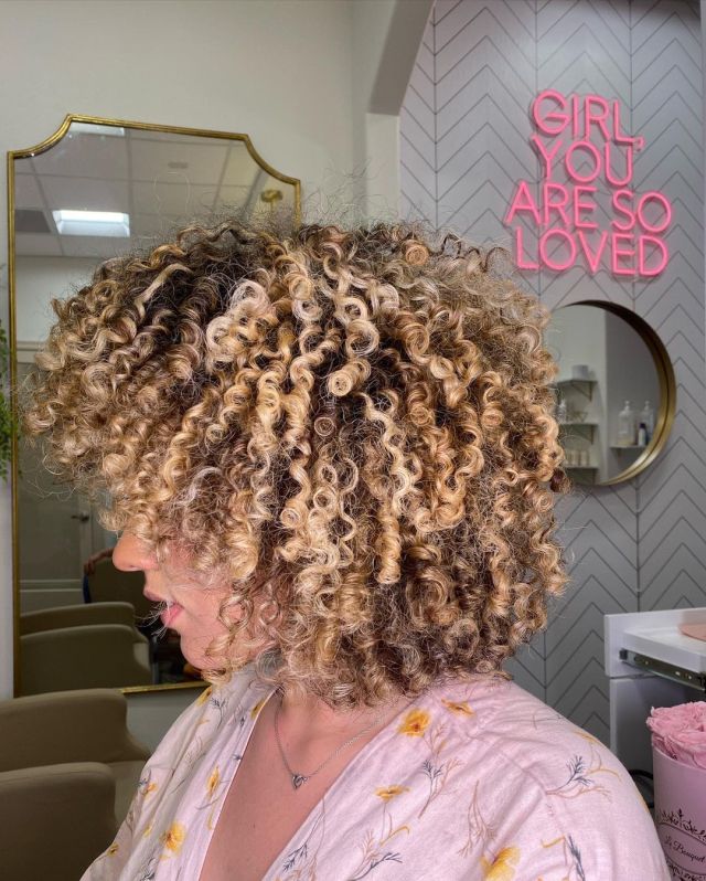 Curly Lob With Golden Blonde Highlights
