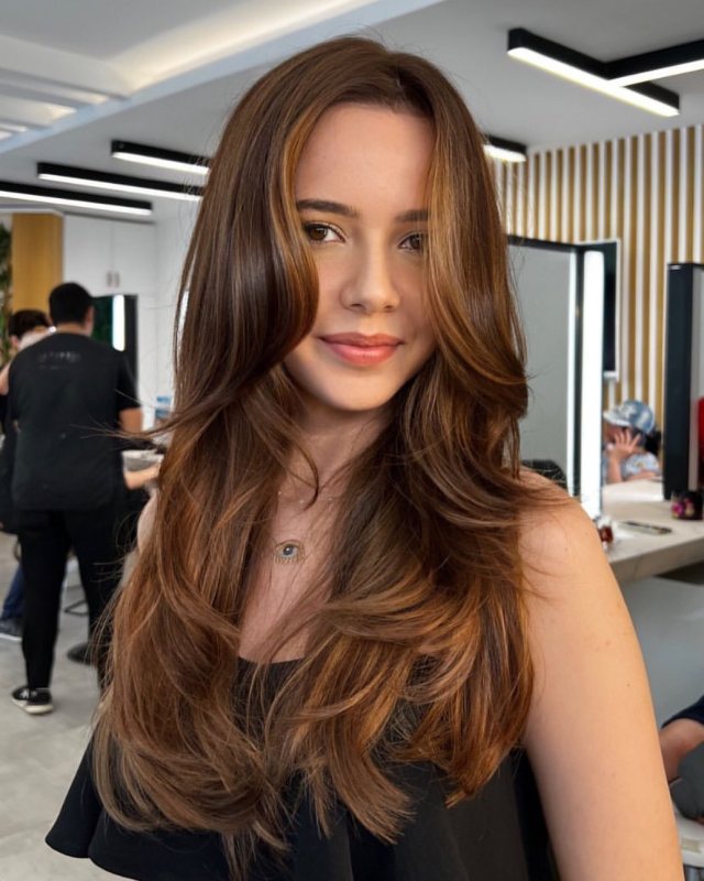 long sleek hair with curtain bangs