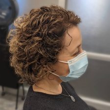 Short Curly Bob with Subtle Highlights Short Curly Bob with Subtle Highlights