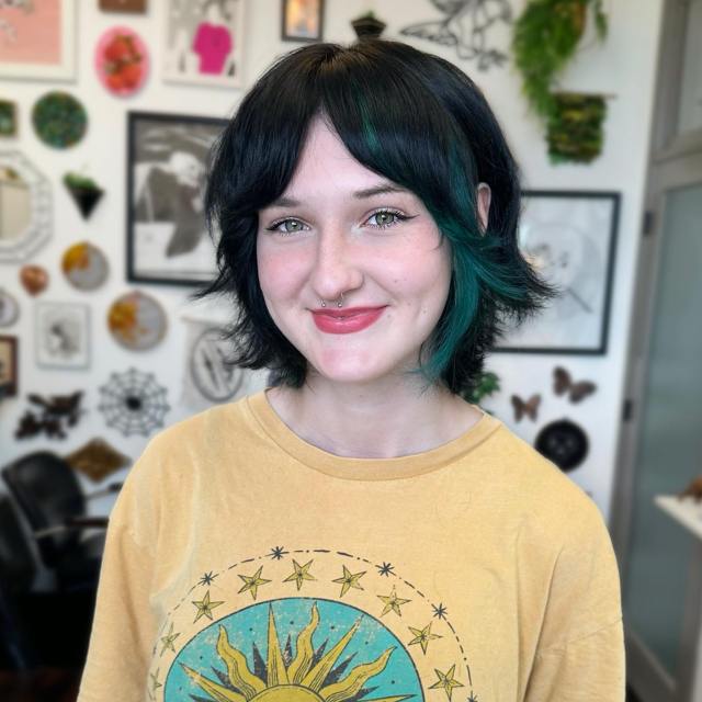 short dark bob with curtain bangs
