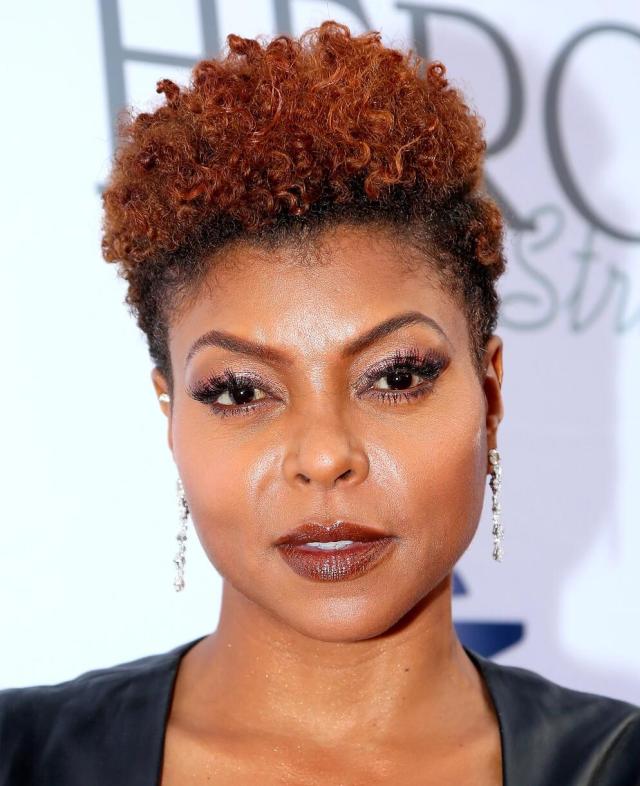 short full red curly hairstyle for women over 50