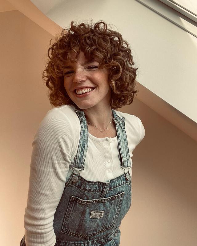 short hair with Curly bangs