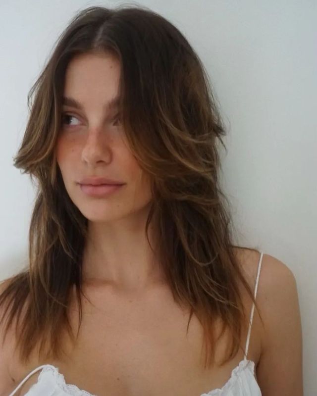 Shoulder Length Balayage hair with curtain bangs