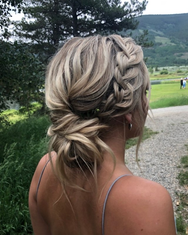 Side French Braid with a Messy Low Bun
