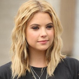 Tousled Curly blonde bob hairstyle